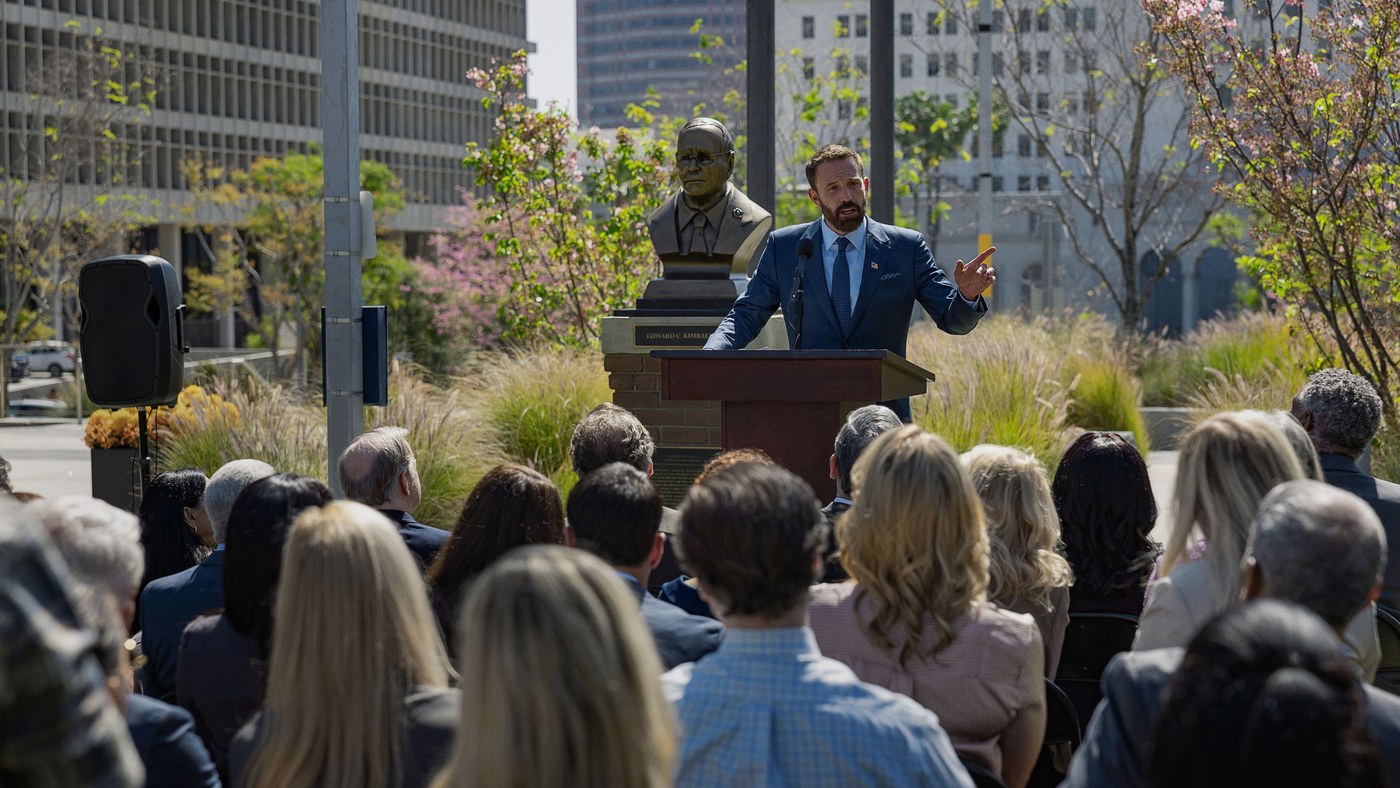 Mark Kimball speaking at a campaign podium.