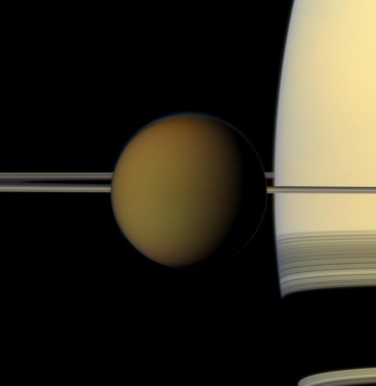 Cassini image of Titan transiting Saturn.